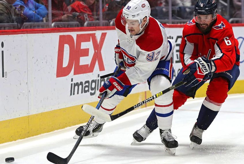  Canadiens’ Jonathan Drouin of the Montreal skates past Capitals’ Michal Kempny at Capital One Arena on Nov. 15, 2019, in Washington, D.C.