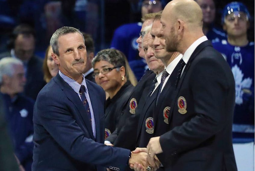Guy Carbonneau is honoured for his induction to the Hockey Hall of Fame prior to the game between the Toronto Maple Leafs and the Boston Bruins at the Scotiabank Arena on Nov. 15, 2019, in Toronto.