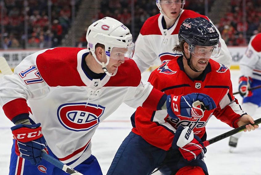  Capitals’ Brendan Leipsic and Canadiens’ Brett Kulak battle for the puck at Capital One Arena on Nov. 15, 2019, in Washington, D.C. Montreal won the game 5-2.