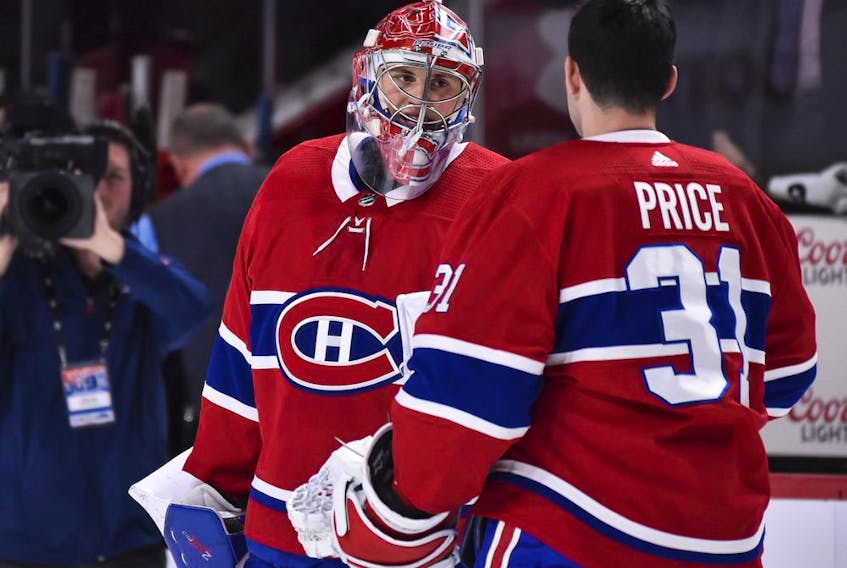  Carey Price congratulates rookie goalie Cayden Primeau after his first NHL victory, a 3-2 overtime win over the Ottawa Senators at the Bell Centre in Montreal on Dec. 11, 2019.