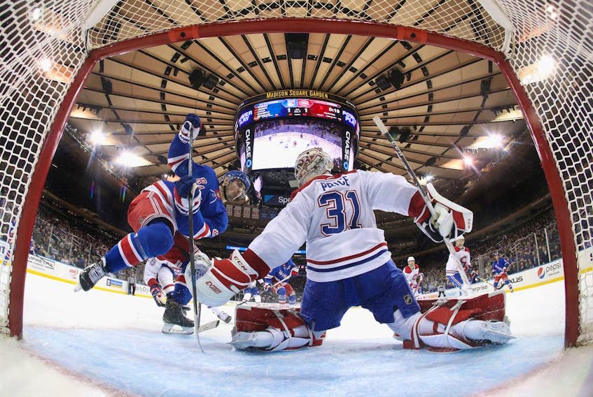 Chris Kreider of the New York Rangers moves in on Carey Price of the Montreal Canadiens during the second period at Madison Square Garden on Dec. 6, 2019, in New York City.