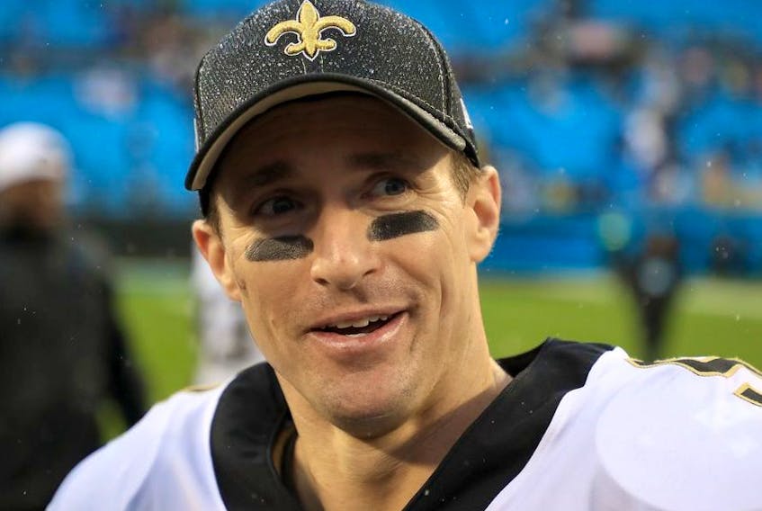 Drew Brees of the New Orleans Saints watches on after defeating the Carolina Panthers 42-10m at Bank of America Stadium on December 29, 2019 in Charlotte, North Carolina.