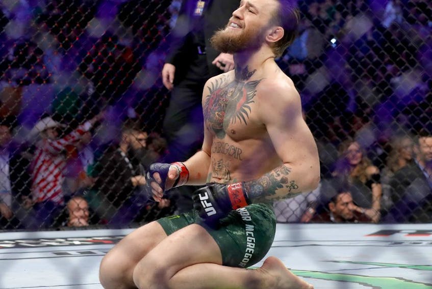 Conor McGregor celebrates his first round TKO victory against Donald Cerrone in a welterweight bout during UFC 246 at T-Mobile Arena on Jan. 18, 2020, in Las Vegas.
