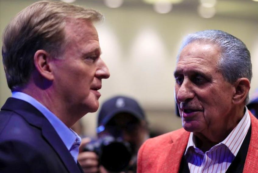 NFL Commissioner Roger Goodell speaks to Atlanta Falcons owner Arthur Blank prior to a press conference for Super Bowl LIV at the Hilton Miami Downtown on January 29, 2020 in Miami, Florida.