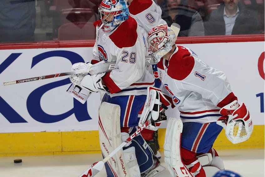 Canadiens' Brendan Gallagher celebrates his team's goal against Islanders goaltender Thomas Greiss during a game in December at the Bell Centre.