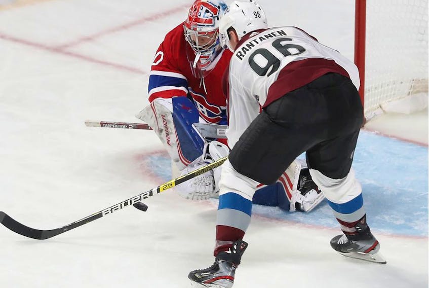  Canadiens goaltender Cayden Primeau stops shot Avalanche’s Mikko Rantanen from close-in during the third period at the Bell Centre Thursday night.