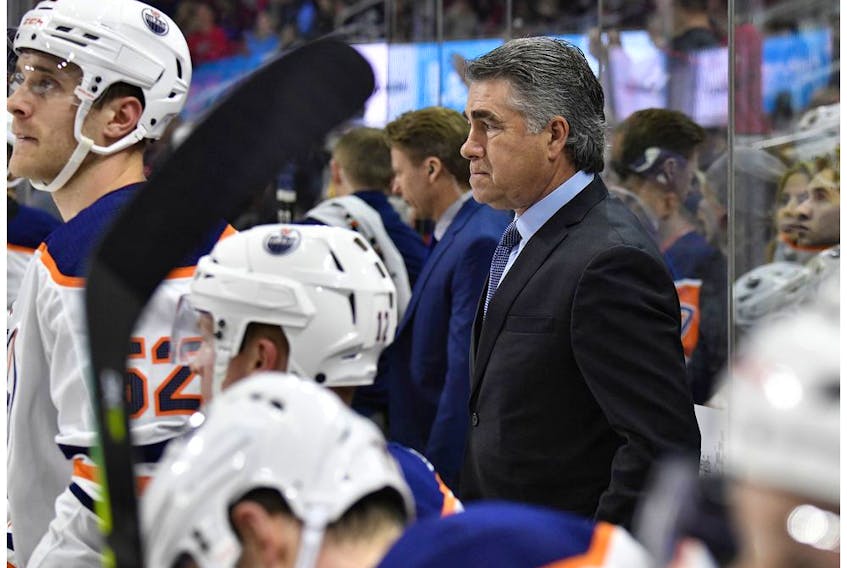 Edmonton Oilers head coach Dave Tippett watches his team play against the Carolina Hurricanes during the second period of their game at PNC Arena on February 16, 2020 in Raleigh, North Carolina.