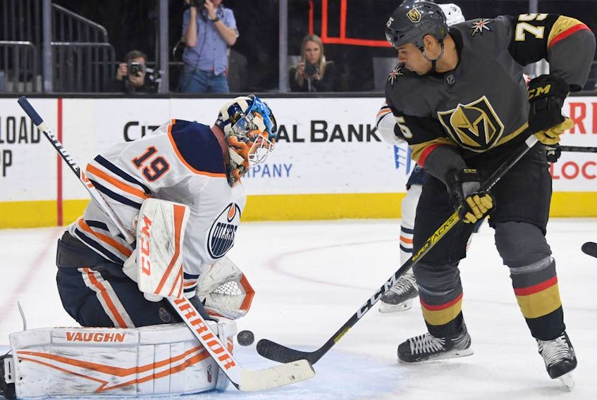 Mikko Koskinen (19) of the Edmonton Oilers defends the net against Ryan Reaves (75) of the Vegas Golden Knights at T-Mobile Arena on Wednesday, Feb. 26, 2020 in Las Vegas.