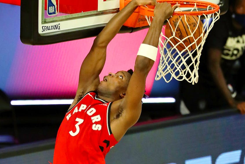 OG Anunoby of the Toronto Raptors makes a reverse dunk against the Brooklyn Nets during the second half in Game 3 of the first round of the NBA playoffs on Friday.  