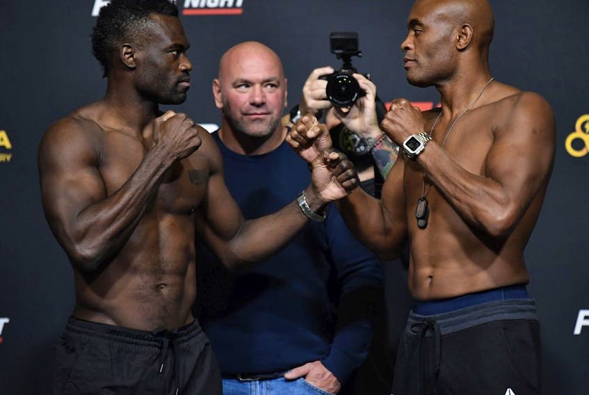 Uriah Hall (left) and Anderson Silva face off during the UFC Fight Night weigh-in at UFC APEX on Oct. 30, 2020 in Las Vegas.