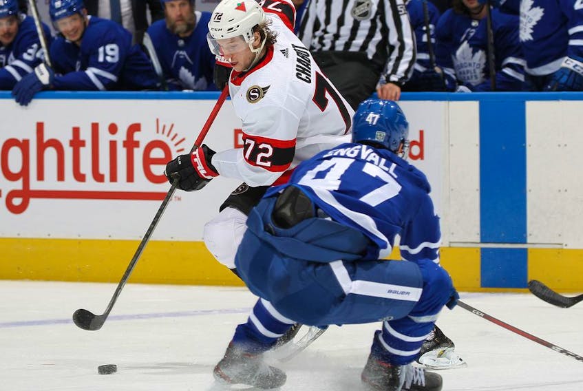 Thomas Chabot of the Ottawa Senators evades Pierre Engvall of the Toronto Maple Leafs at Scotiabank Arena on Feb. 15, 2021 in Toronto.
