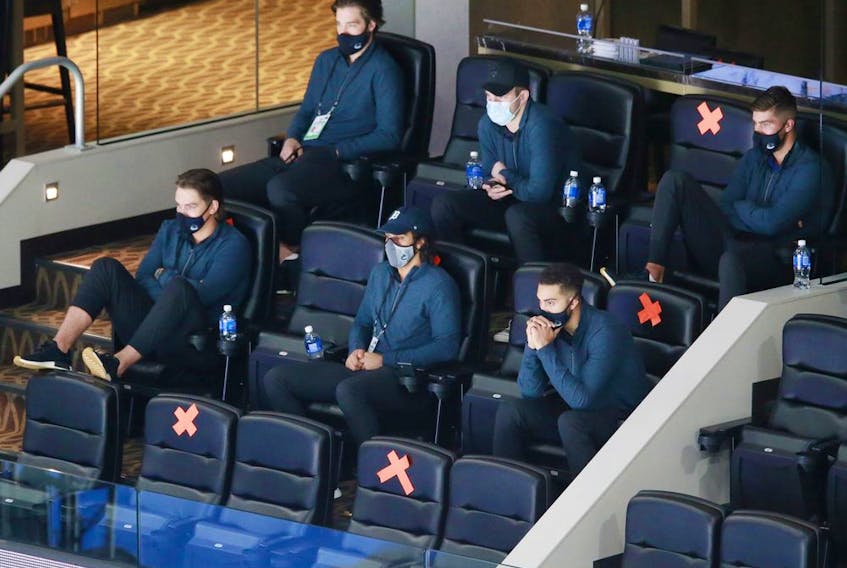 Vancouver Canucks scratch players watch an exhibition game against the Winnipeg Jets prior to the 2020 NHL Stanley Cup Playoffs at Rogers Place on July 29, 2020 in Edmonton, Alberta.
