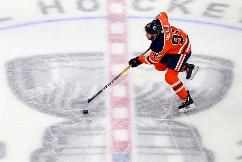 Edmonton Oilers star Connor McDavid skates through centre ice on AUg. 3, 2020, at Rogers Place during Game 2 of his team's Stanley Cup Playoffs qualifying series against the Chicago Blackhawks.