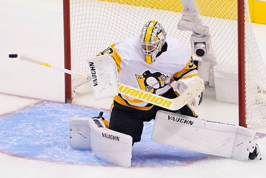 Matt Murray of the Pittsburgh Penguins defends the net against the Montreal Canadiens in Game Three of the Eastern Conference Qualification Round prior to the 2020 NHL Stanley Cup Playoffs at Scotiabank Arena on August 5, 2020 in Toronto, Ontario.