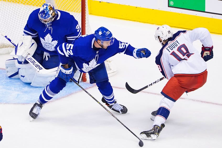 Liam Foudy of the Columbus Blue Jackets scores a third period goal at 11:40 past Frederik Andersen, left, of the Toronto Maple Leafs in Game Five of the Eastern Conference Qualification Round prior to the 2020 NHL Stanley Cup Playoffs at Scotiabank Arena on August 9, 2020 in Toronto. 