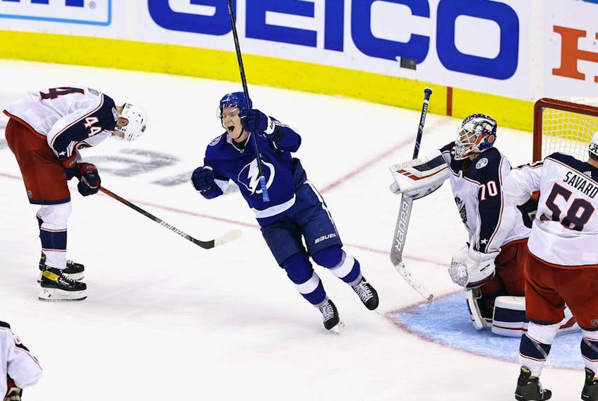 Lightning's Ondrej Palat celebrates the winning goal by Brayden Point (not shown) against the Columbus Blue Jackets at 10:27 of the fifth overtime period in Game 1 of first-round playoff series at Scotiabank Arena on Aug. 11, 2020 in Toronto. 