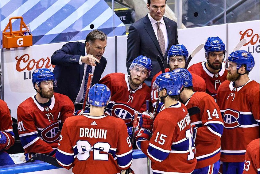 Interim head coach Kirk Muller of the Montreal Canadiens speaks to his team during a timeout against the Philadelphia Flyers during Game 3 of their first-round playoff series at Scotiabank Arena on Aug. 16, 2020, in Toronto.