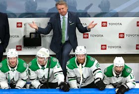 Head coach Rick Bowness of the Dallas Stars reacts to a penalty call in Game 5 of the Western Conference second round of the 2020 NHL Stanley Cup Playoffs at Rogers Place on Aug. 31, 2020.