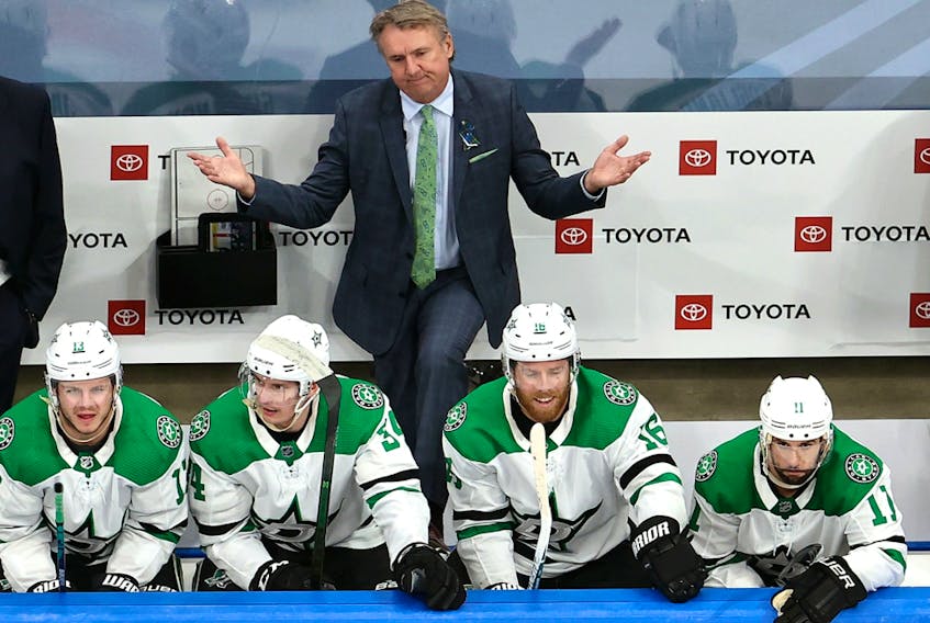 Head coach Rick Bowness of the Dallas Stars reacts to a penalty call in Game 5 of the Western Conference second round of the 2020 NHL Stanley Cup Playoffs at Rogers Place on Aug. 31, 2020.