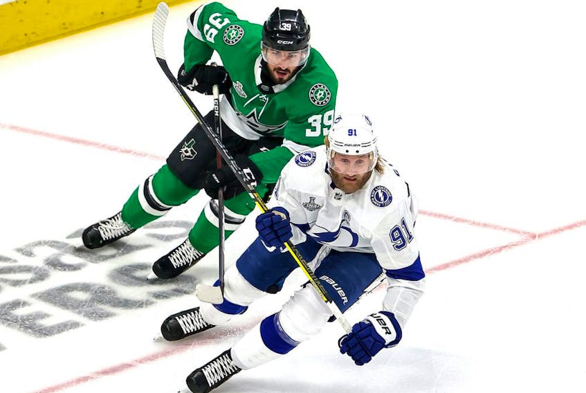 Steven Stamkos (91) of the Tampa Bay Lightning skates against Joel Hanley (39) of the Dallas Stars during the first period in Game Three of the 2020 NHL Stanley Cup Final at Rogers Place on September 23, 2020. 