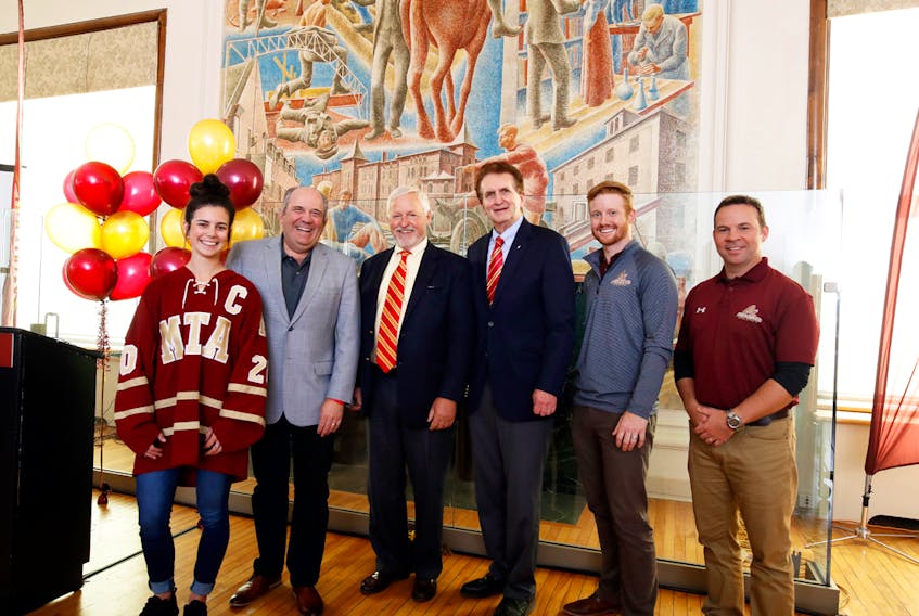From left to right: Heather Richards, event emcee and captain of the Mount Allison hockey Mounties, David Booth, Mount Allison graduate and friend, Jim Rogers, former chairman with BackOffice Associates, Mount Allison president Robert Campbell, Scott Yorke, Mount Allison graduate and former Mountie athlete, and Pierre Arsenault, director of athletics and recreation at Mount Allison. PHOTO SUBMITTED