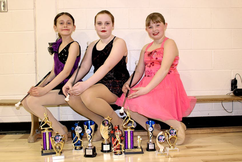Sackville baton twirlers, l-r, Tesfa Cruttwell, Sophi Boomer-Searle and Payton Harper have been taking home plenty of hardware from recent twirling competitions throughout the Maritimes.
