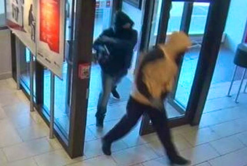 The RCMP have released this photo of suspects in an armed robbery of bank in Cap-Pelé on Aug. 30.