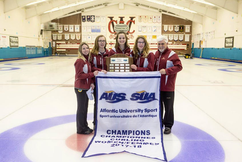 Sackville’s Julia Hunter will be in Alberta later this month seeking a pair of national crowns. Pictured, left to right, are AUS champions Krista Nix, skip, Samantha Crook, Hunter, Sarah Doak and coach Jim Nix. Hunter will also be competing in the national mixed doubles championship.