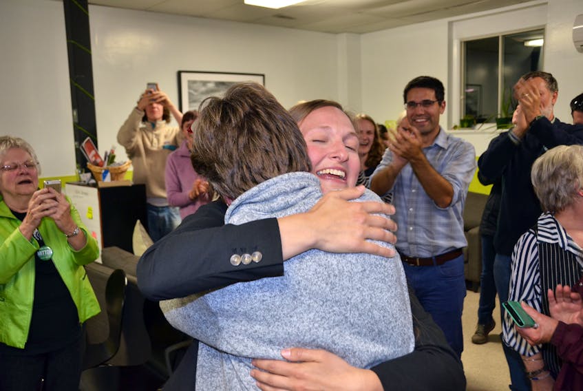 Memramcook-Tantramar Green Party candidate Megan Mitton embraces her campaign manager Sabine Dietz after learning she was elected as the riding’s new MLA.