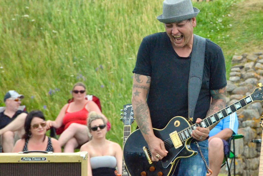 Stephen LeBlanc rocks out during Sunday afternoon’s second annual Guitar War in the Fort at Fort Beauséjour-Fort Cumberland National Historic Site. More than 400 people came out for the performance, more than double last year’s attendance.