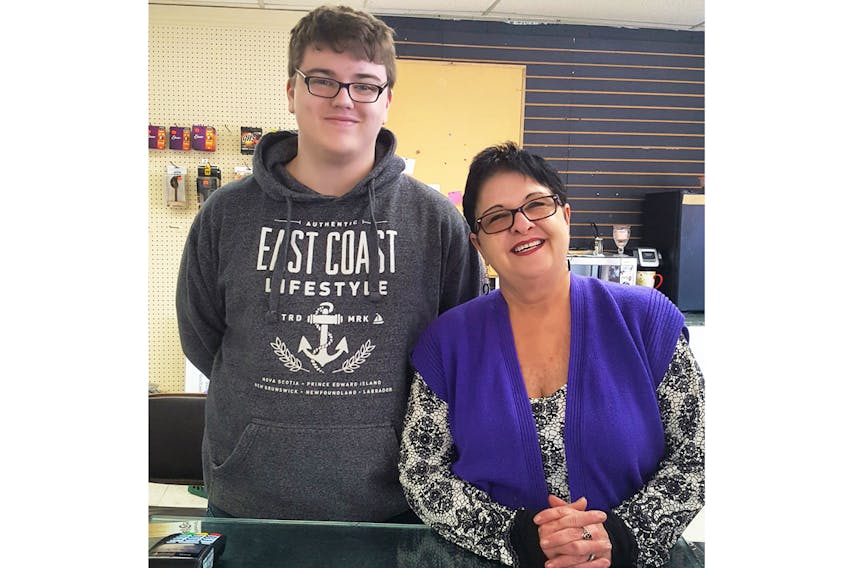 Payless Liquidation manager Moyra Boone, shown with store employee Luke Novak, has been in charge of the new Sackville business since August 2018, although the store didn't officially open until November of last year.