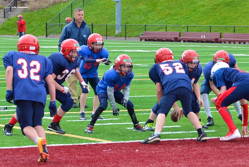 Former Sackville Minor Football Association president Tim Cormier, shown above overseeing a drill at last year’s spring training camp, continues to help local youth become better athletes and future leaders in the community.