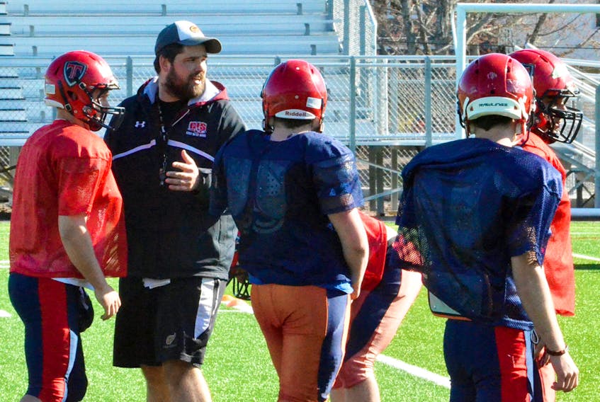 Gaétan Richard, shown above working with Tantramar Titans during their 2017 spring training camp, has announced he will be leaving the Mount Allison football Mountie coaching staff.