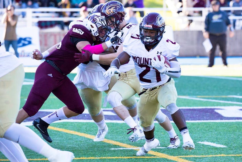 Mountie Chris Reid was good for 121-yards running in Saturday’s game against the Huskies. PAUL D. LYNCH PHOTO