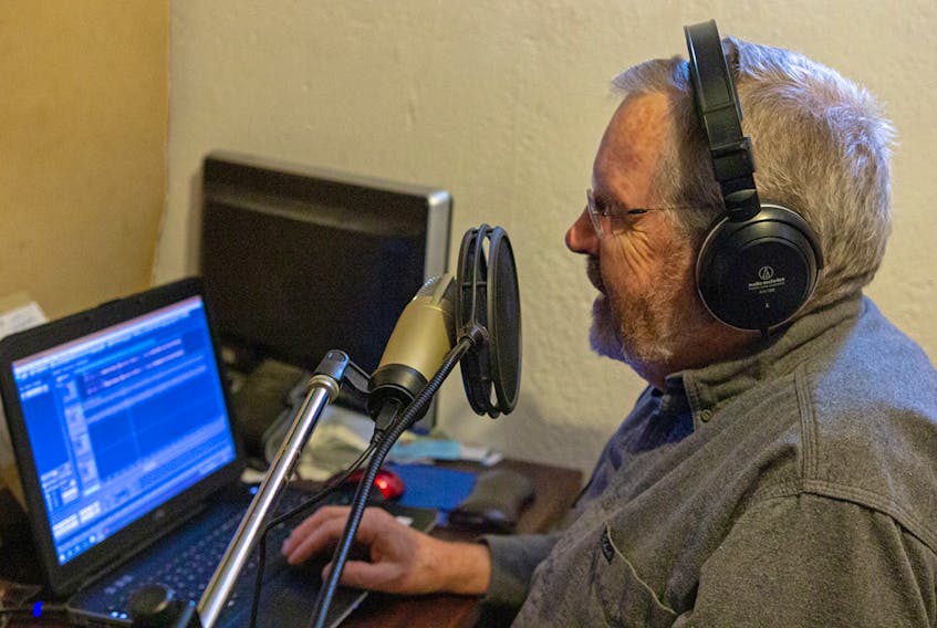 R.A. Lautenschlager records his weekly radio show, Simply Folk, in his home-based studio.  WENDY PRICE PHOTO