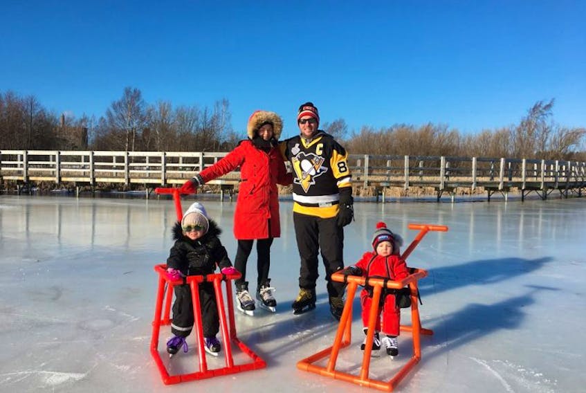 Martine and Chris Patterson, shown here with their kids Emma and Jake, have invented a harness that is deigned to teach children at a young age to skate while also helping ease the load off parents’ backs.