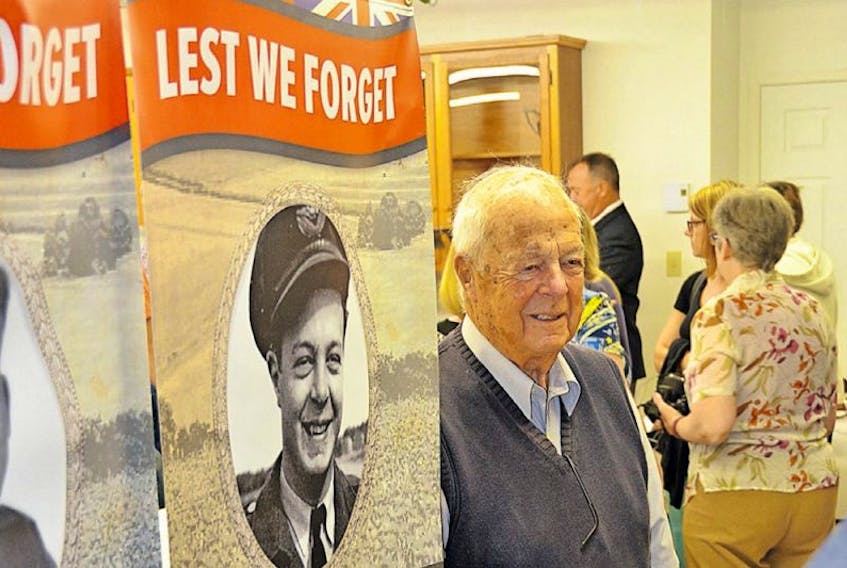 Douglas Hamm is pictured during the September 2016 unveiling of the Sackville Legion’s banner project. The event saw a total of 16 banners unveiled, with each paying tribute to an area veteran. Above, Hamm stands beside the banner unveiled in his honour.