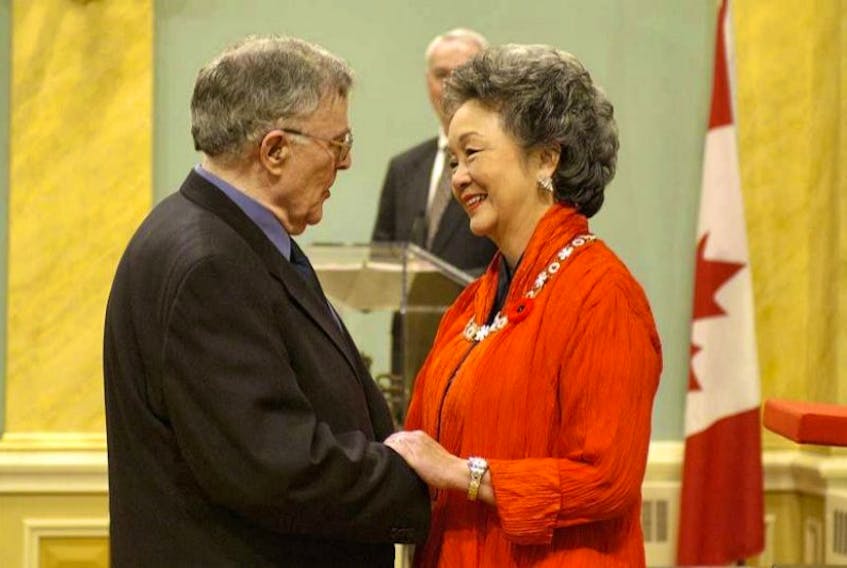 Eldon Hay is presented with the Order of Canada in 2004 by Adrienne Clarkson, former Governor General of Canada.
