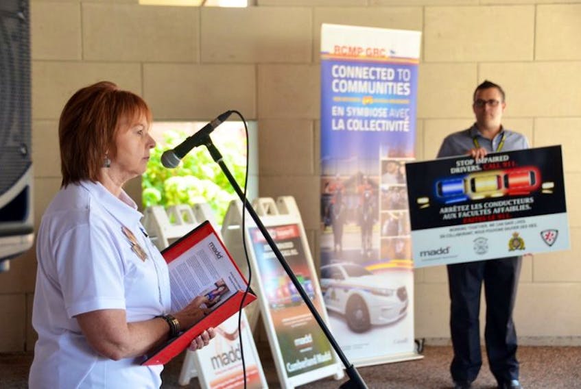 Susan MacAskill, MADD Canada’s Atlantic services manager, speaks during last week’s official launch of the new Cumberland-Tantramar MADD chapter. Standing on the right is Sackville community policing officer Jean-Francois LeBlanc.