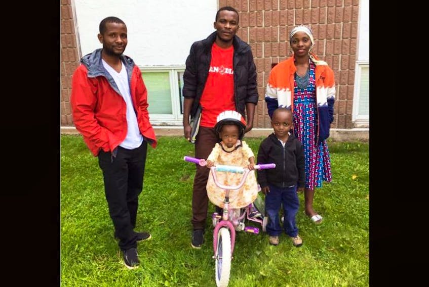 Kintu Songolo Ramazani, left, and his brother Jafari, along with Jafari’s wife Mwaliasha and their two children, Rehema, 2, and Abdallah, 4, are making a new home in Sackville. The Congolese family has recently resettled to Canada from the Kakuma Refugee Camp in Kenya.