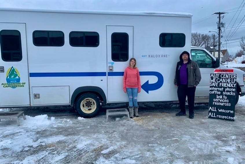 Ally Centre of Cape Breton employees Carissa Barry and Richard Carrigan at the centre’s new mobile unit, which will assist in making its services more accessible to communities throughout the region.