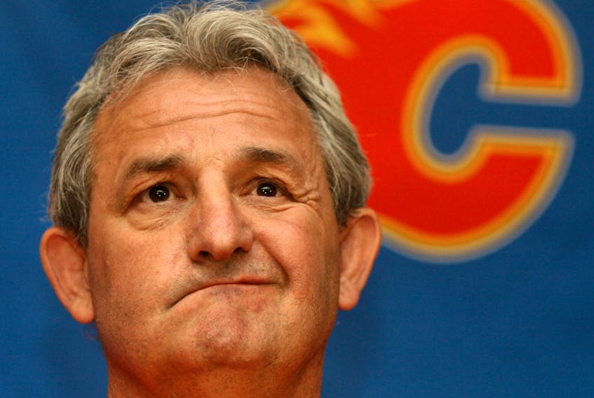 Darryl Sutter addresses the media in this file photo from May 26, 2009, back when he was general manager of the Calgary Flames. The club announced him as the new head coach Friday.
