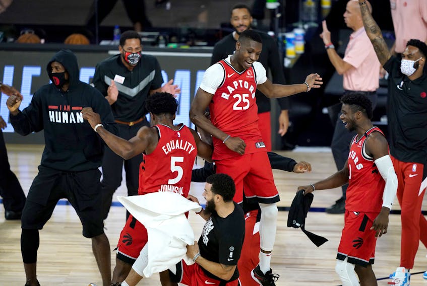 Toronto Raptors players celebrate during their win over Philadelphia last week.
