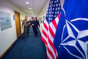 Marine Corps Gen. Joe Dunford, then chairman of the Joint Chiefs of Staff, walks to meet with Kay Bailey Hutchison, then U.S. Ambassador to NATO, ahead of the 178th Military Committee in Chiefs of Defense Session at NATO headquarters, in Brussels, Belgium on Jan. 15th, 2018. - U.S. Department of Defence / Navy Petty Officer 1st Class Dominique A. Pineiro