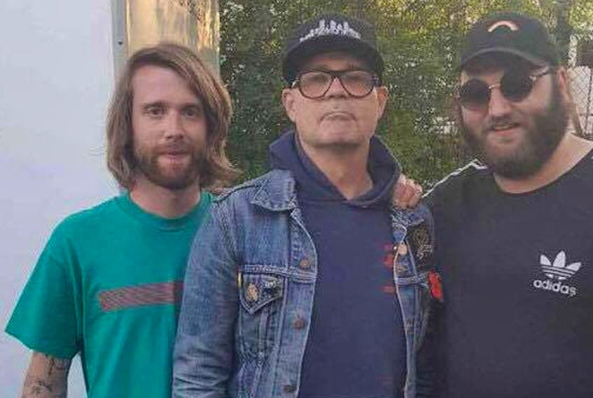 Springhill High School graduate and Halifax musician Keith McFadden (left) and Walrus band mate Jordan Murphy (right) met the late Gord Downie this summer at a Toronto music festival. 
Submitted photo