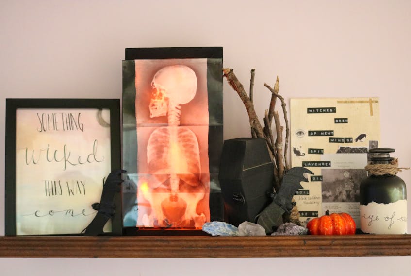Set up you Halloween decor on a floating shelf near your entry-way for an immediate impact when people enter your home.