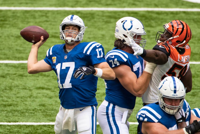 Indianapolis Colts quarterback Philip Rivers throws a pass against the Bengals.