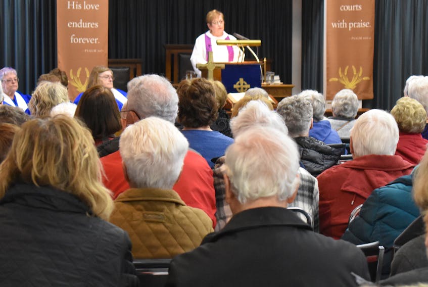 Rev. Bonnie Wynn presides over the last sermon of the Lenten ecumenical series at St. Paul’s Presbyterian Church in Glace Bay on April 17. The ecumenical services involved at least nine different congregations and churches in Glace Bay and surrounding areas and are very popular. Average attendance for the sermons was 200 people, with two of the seven services attracting 250.