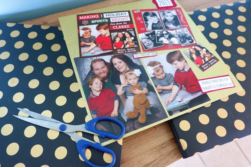 It doesn’t take artistic ability or fancy craft supplies to create a Christmas scrapbook. You just need scissors, glue, photos and Christmas cards.  Heather Laura Clarke photos