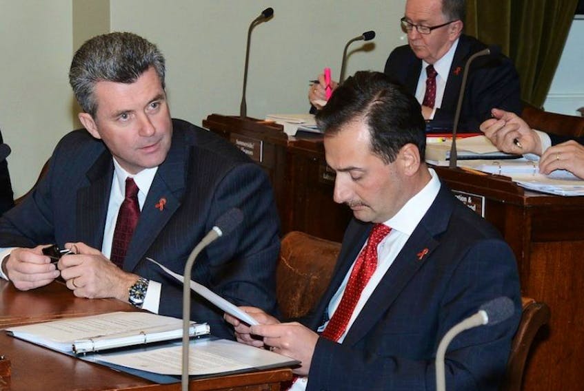 Finance Minister Wes Sheridan and Premier Robert Ghiz before the first question period of the fall sitting of the P.E.I. legislature Wednesday.
